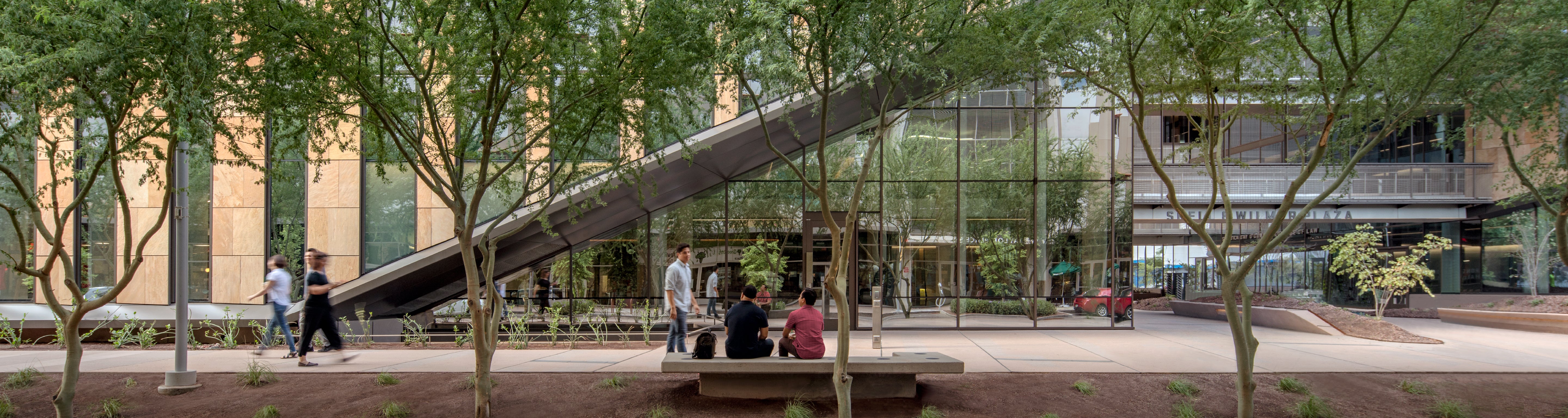 Students sitting and walking outside of Beus Center for Law and Society