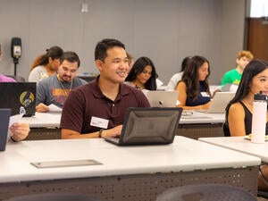 student on a computer